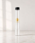 Tube en verre avec un bouchon à vis en aluminium pour la marque Andriava pouvant contenir des gousses de vanille de Madagasacar